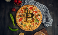 Bitcoin pizza with bitcoin logo to celebrate pizza day.