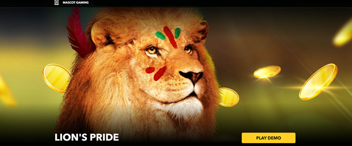 Lion’s Pride slot game by Mascot Games demo game logo of lion with tribal paint and flying gold coins.